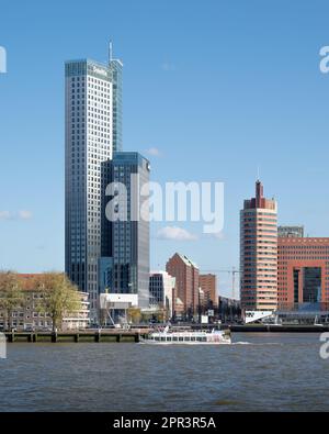 Rotterdam, Netherlands - Bridgewatcher's House and quayside development at Kop van Zuid by Bolles Wilson over River Maas Stock Photo