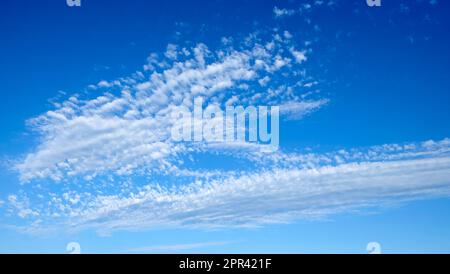 Cirrocumulus cloud high in a blue sky on a summer evening above Carmarthenshire Wales UK  KATHY DEWITT Stock Photo