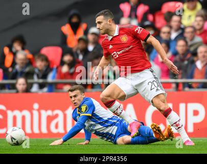 London, UK. 23rd Apr, 2023. 23 Apr 2023 - Brighton and Hove Albion v Manchester United - Emirates FA Cup - Semi Final - Wembley Stadium. Manchester United's Diogo Dalot and Brighton's Solly March during the FA Cup semi-final. Picture Credit: Mark Pain/Alamy Live News Stock Photo