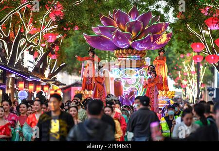 Xi'an, China's Shaanxi Province. 25th Apr, 2023. People watch a float parade at the Great Tang All Day Mall in Xi'an, northwest China's Shaanxi Province, April 25, 2023. Credit: Zou Jingyi/Xinhua/Alamy Live News Stock Photo