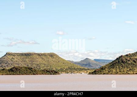 Yachts are visible in the harbor of the overflowing Gariep Dam, the largest dam in South Africa Stock Photo