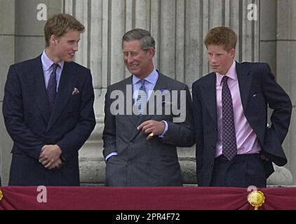 File photo dated 04/08/00 of Prince William (Duke of Cambridge), the Prince of Wales and Prince Harry (Duke of Sussex) on the balcony of Buckingham Palace, in London for the celebrations to mark the 100th birthday of Queen Elizabeth, the Queen Mother. Issue date: Wednesday April 26, 2023. Stock Photo