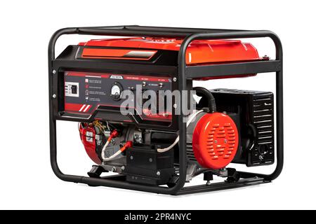 Portable red electric generator isolated on white for backup energy Stock Photo