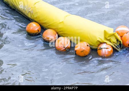 Orange buoy Used in the form of water made from special plastic that is strong and durable Stock Photo