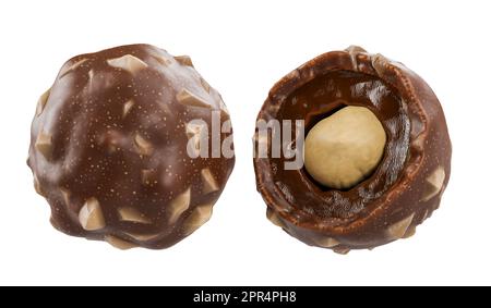 Two chocolate ball whole and half with hazelnuts isolated on white background - 3D rendering Stock Photo