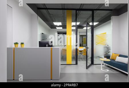 Reception welcome area in it office interior. Minimal desig. Glass wall. Stock Photo