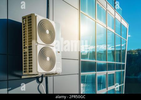 Metal Wall-Mounted Air Conditioning System for Energy-Efficient Modern Buildings. Stock Photo