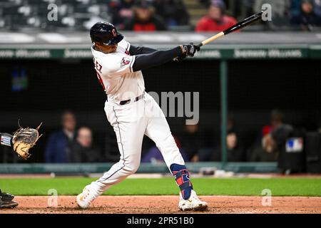 Cleveland Guardians' Oscar Gonzalez hits a double during the sixth