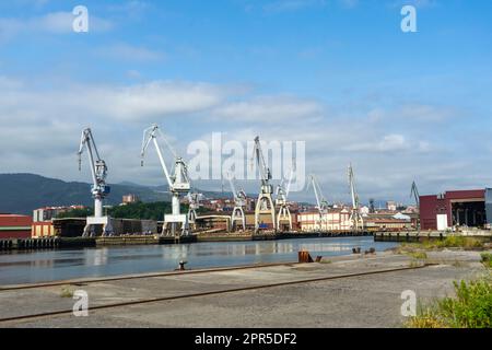 portal cranes. portal cranes in the port. cargo loading area Stock Photo