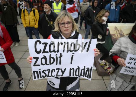 Warsaw, Poland. 26h April, 2023. People rally under the slogan 'No nucelar weapons in Belarus' on the 37th anniversary of the Chernobyl nuclear reactor disaster in Warsaw, Poland on 26 April, 2023. Credit: Jaap Arriens/Alamy Live News. Stock Photo