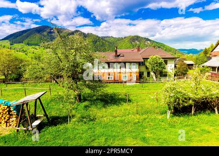 The Farmer's house is in the high mountains. Stock Photo
