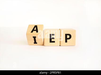 AEP or IEP symbol. Concept words AEP annual enrollment period IEP initial enrollment period. Beautiful white table white background. Medical annual or Stock Photo