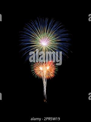 Night colorful fireworks on black background Stock Photo