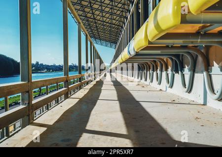Yellow chairs in stands of a sports institution. Empty stands of the stadium Stock Photo