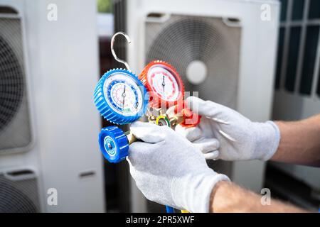Industrial Air Conditioning Technician Stock Photo