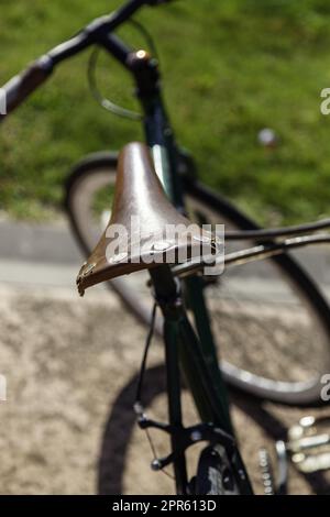 Leather bicycle saddle Stock Photo