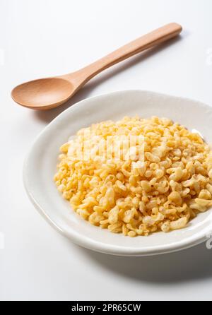 Tenkasu served on a plate placed on a white background. Stock Photo