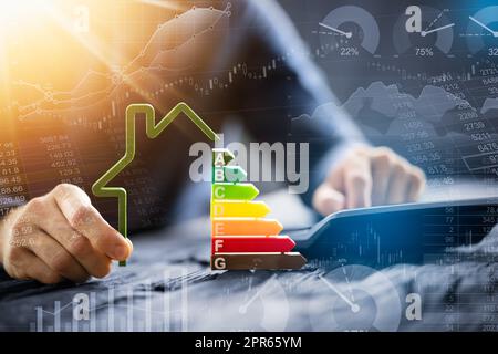 Close-up of a businessman using calculator Stock Photo