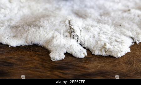 Handcrafted white sheepskin Stock Photo