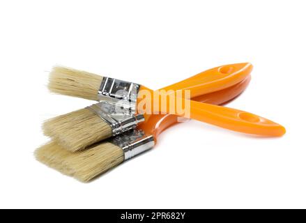 New paint brush with handle isolated on white background Stock Photo