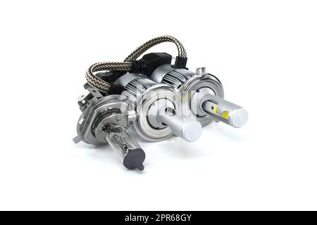 H4 halogen lamp and LED headlight bulbs on white Stock Photo