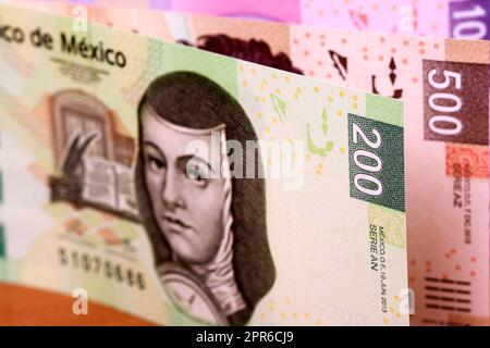 Mexican peso a business background. Stock Photo