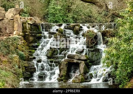 Ornamental cascade waterfall in Virginia Water, Surrey, United Kingdom Stock Photo