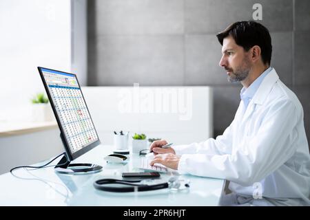 Medical Bill Codes And Spreadsheet Data Stock Photo