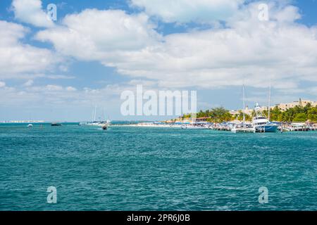 Port with sailboats and ships in Isla Mujeres island in Caribbean Sea, Cancun, Yucatan, Mexico Stock Photo