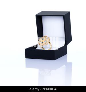 Blue Sapphire and Diamond Jewel or gems ring in dark blue jewel box. Collection of natural gemstones accessories. Studio shot Stock Photo