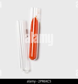 Closeup chemical ingredient on white laboratory table. Potassium Ferricyanide in test tube. Stock Photo