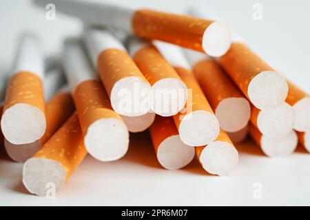 Cigarette, roll tobacco in paper with filter tube, No smoking concept. Stock Photo