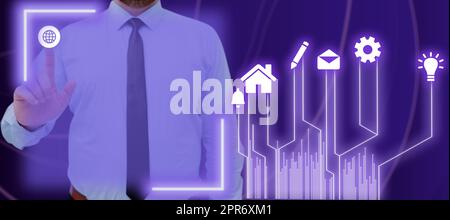 Businessman Pointing On The Internet Symbol And Displaying Multiple Digital S In A Futuristic Design. Man In A Necktie Presenting Important Information And New Ideas. Stock Photo