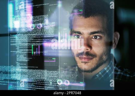 Software engineering. Cropped shot of a young computer programmer looking through data. Stock Photo