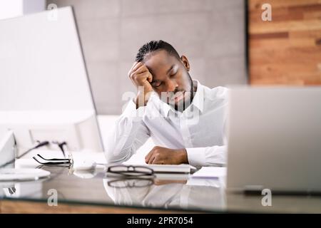 Bored Boss Man Sleeping Stock Photo - Alamy