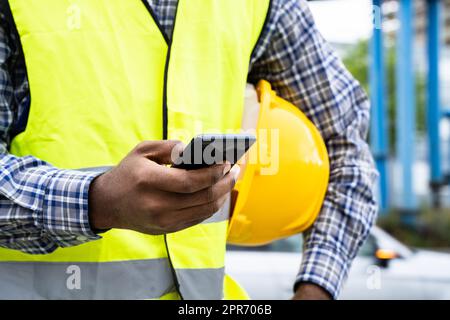 Construction Worker Smartphone Call Stock Photo