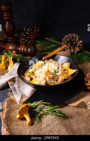 Chanterelles with pasta and cream sauce Stock Photo