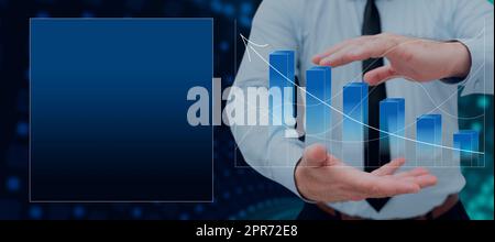 Businessman With Digitally Generated Bar Graph And Line Graph With Arrow Moving Up In Hands. Man Showing Data And Box With Copy Space For Advertisement And Branding. Stock Photo