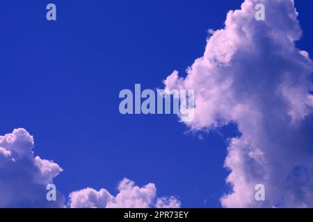 Beautiful storm clouds on the blue sky. An approaching storm. Stock Photo