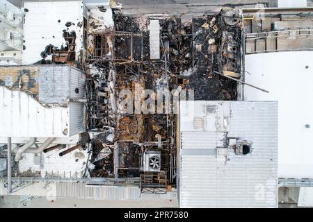 building that has been heavily damaged by fire Stock Photo