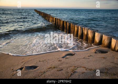 Footprints on the beach Stock Photo