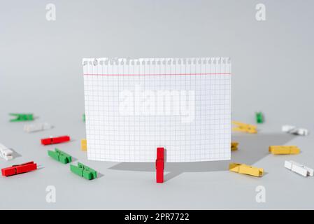 Important Message Presented On Piece Of Paper Clipped With Clip With Paperclips All Aroud. Crutial Information Written On Note. Critical Announcement Displayed On Memo. Stock Photo