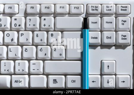 Important Messages Written On Keyboard Buttons With Pen Placed Between Them. Crutial Informations Presented On Pc Keys. Critical Announcemets Displayed. Stock Photo