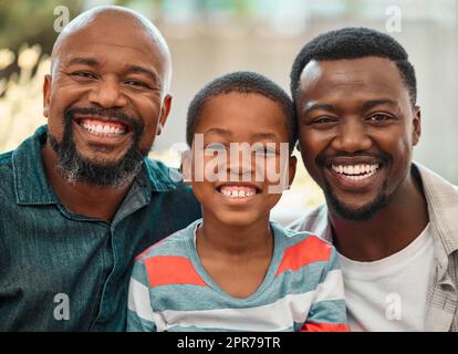 The smile runs in our family. a family spending time together at home. Stock Photo