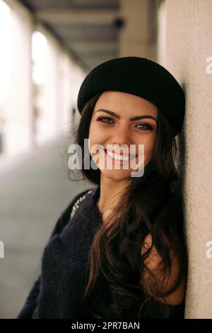 woman dressed in retro style walking around the city. Stock Photo