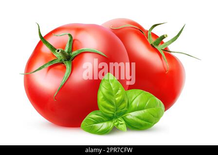 Two tomatoes and basil isolated on white background Stock Photo