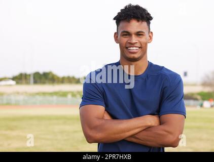 Building muscles takes dedication. a young man after a workout. Stock Photo