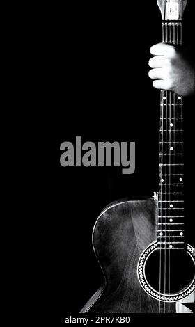 Photo of an accoustic guitar made with black and white patterns Stock Photo