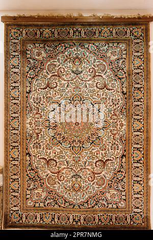 Red Oriental Indian Carpet Texture Background. Stock Photo