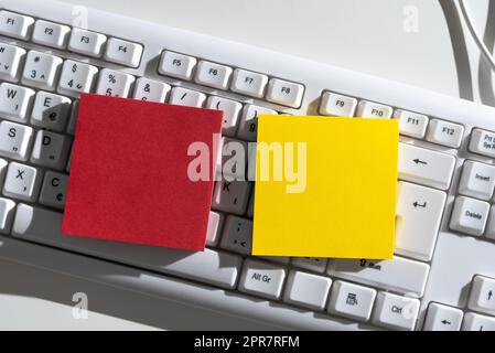 Important Messages Written On Two Notes On Desk Above Keyboard. Crutial Informations Presented On Different Memos On Office Table. Recent Updates Shown. Stock Photo